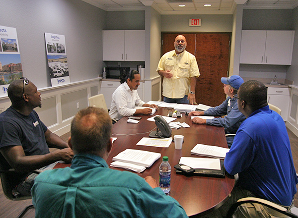 construction planning meeting with project managers