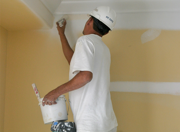 painting trim and wall in orlando hotel