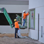 Construction on exterior walls and windows of building in orlando fl